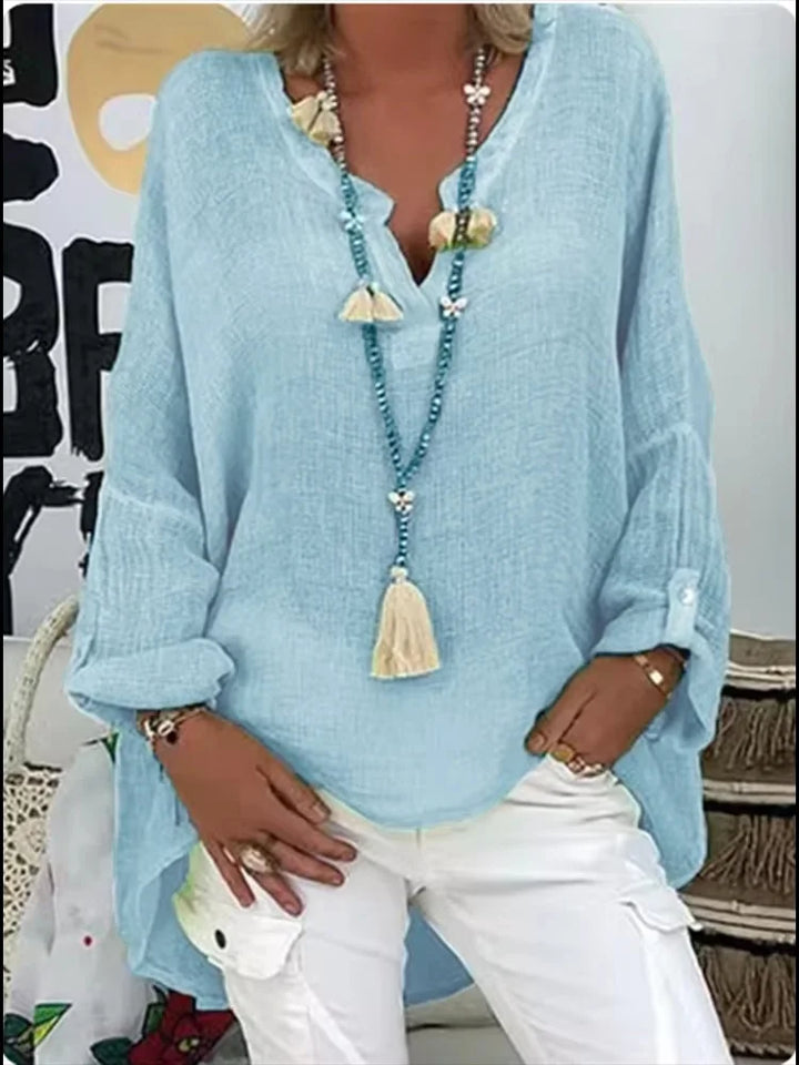 Women's effortless chic oversized blouse top, perfect for a relaxed yet elegant casual look.