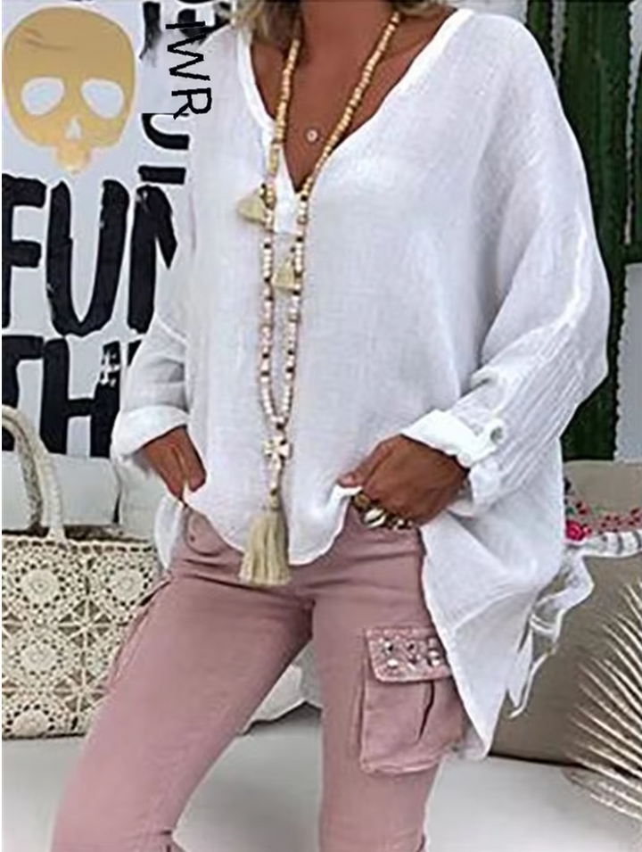 Elegant casual women's fashion top, an oversized blouse offering chic style and everyday comfort.