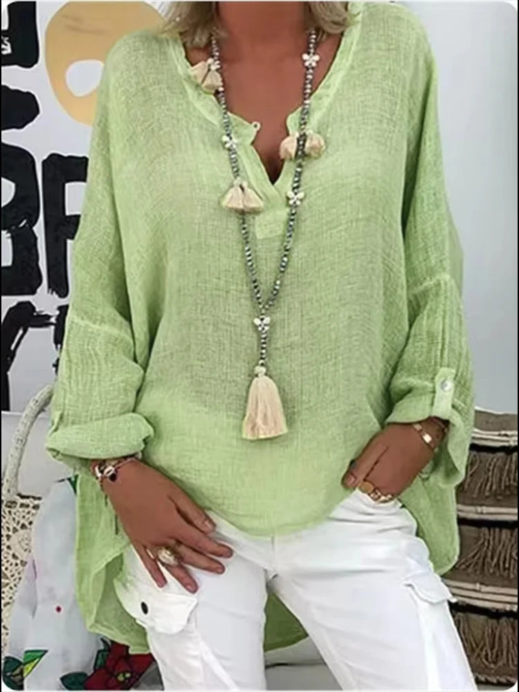 Chic oversized women's blouse, a versatile summer top perfect for effortless style and comfort.