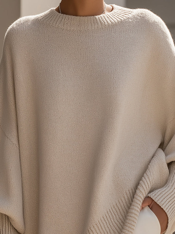 Cozy women's oversized sweater, chic relaxed fit, perfect for stylish everyday layering & comfort.