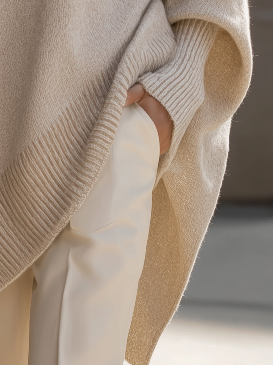 Modern women's oversized sweater, relaxed fit, chic style, perfect for contemporary fashion.