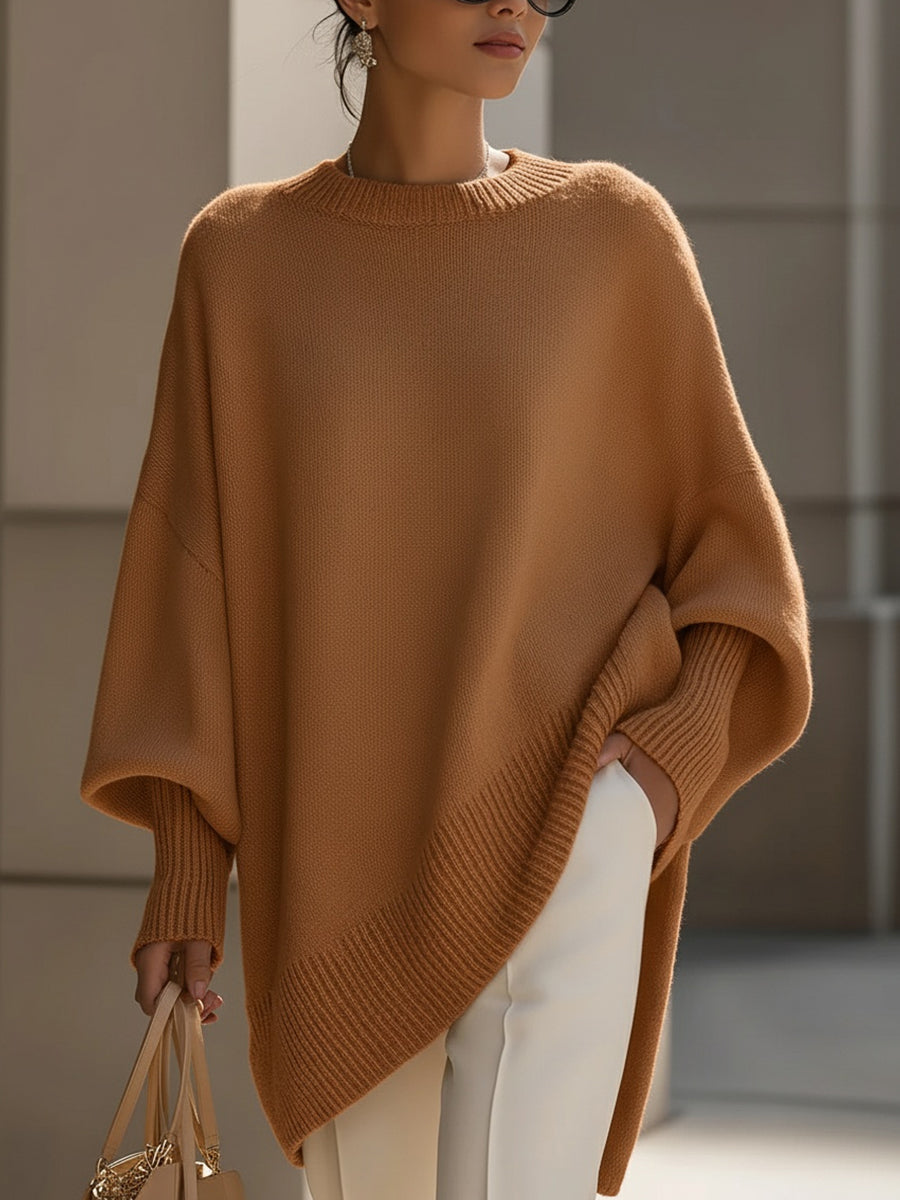 Knit oversized women's sweater, chic relaxed fit, cozy texture, stylish modern fashion.