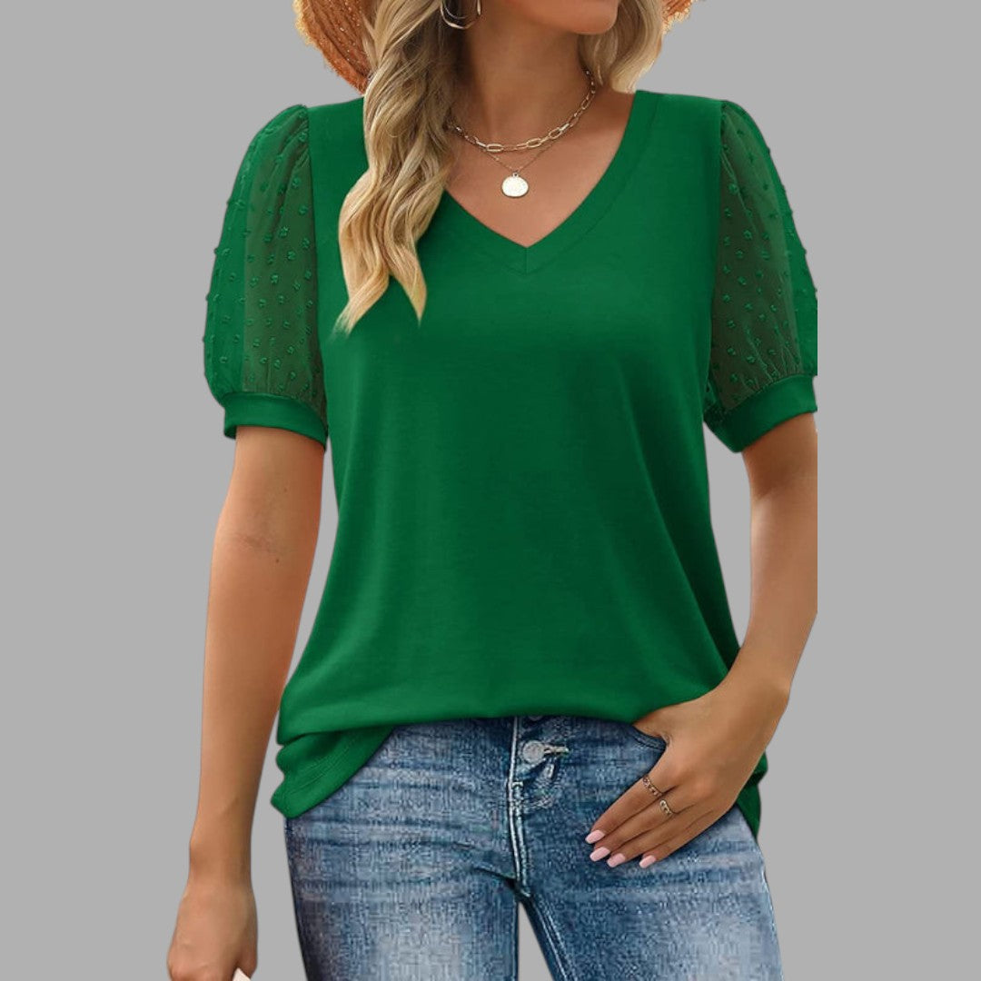 Elegant long sleeve women's blouse, offering effortless comfort. Versatile and stylish top for a sophisticated casual look.