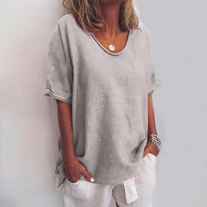 Soft, comfortable women's blouse with a graceful flowy fit. Ideal for casual and elegant everyday wear.