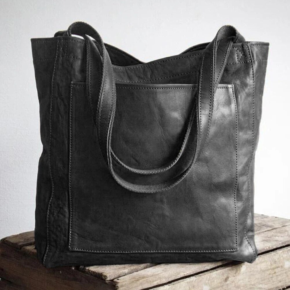 Black Women's Everyday Tote Bag. Versatile shoulder bag & daily carryall, essential women's accessory.