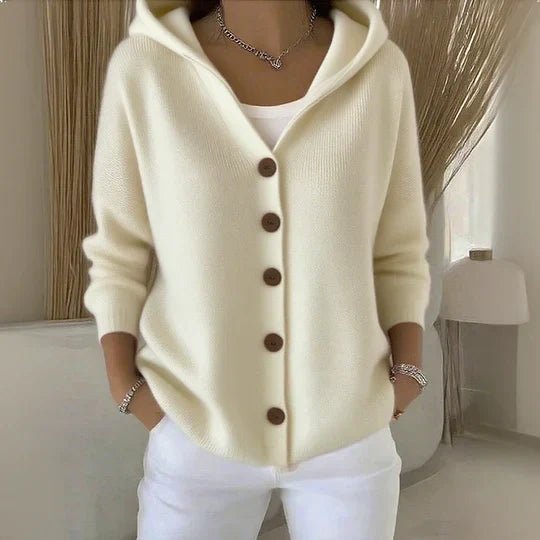 Relaxed fit women's hooded cardigan with buttons, ideal for fall fashion & winter warmth. Cozy knit.