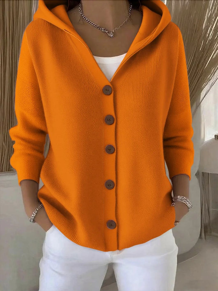 Women's hooded button-front cardigan. Relaxed fit, cozy knit, a versatile layering piece for cold weather.