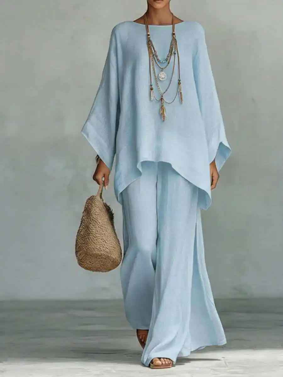 Soft linen blend two-piece set for women. Enjoy relaxed comfort in this oversized top and wide-leg pant summer outfit.