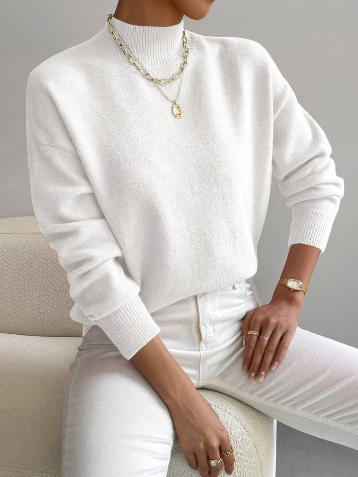 Comfortable women's mock turtleneck pullover with a relaxed fit for everyday chic and winter wear.