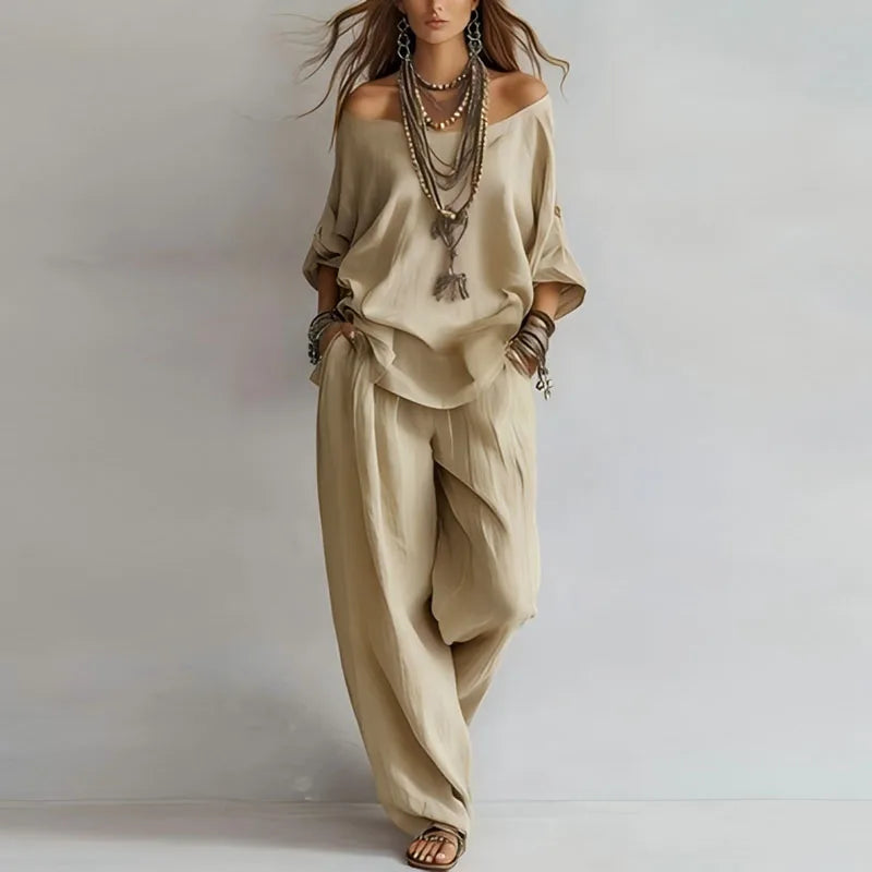 Complete women's off-shoulder co-ord set, a fashionable two-piece matching outfit with wide-leg pants for casual summer wear.