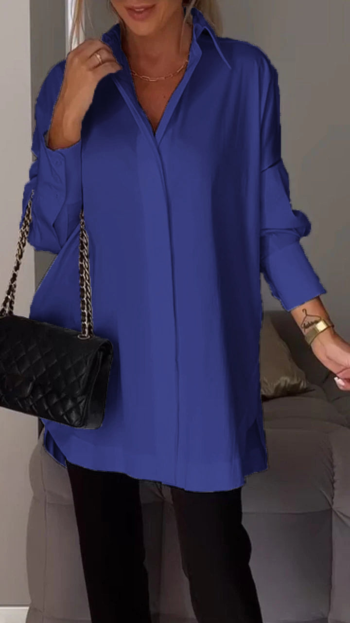 Effortless women's oversized blouse, a chic collared shirt providing comfort and versatile style for any occasion.