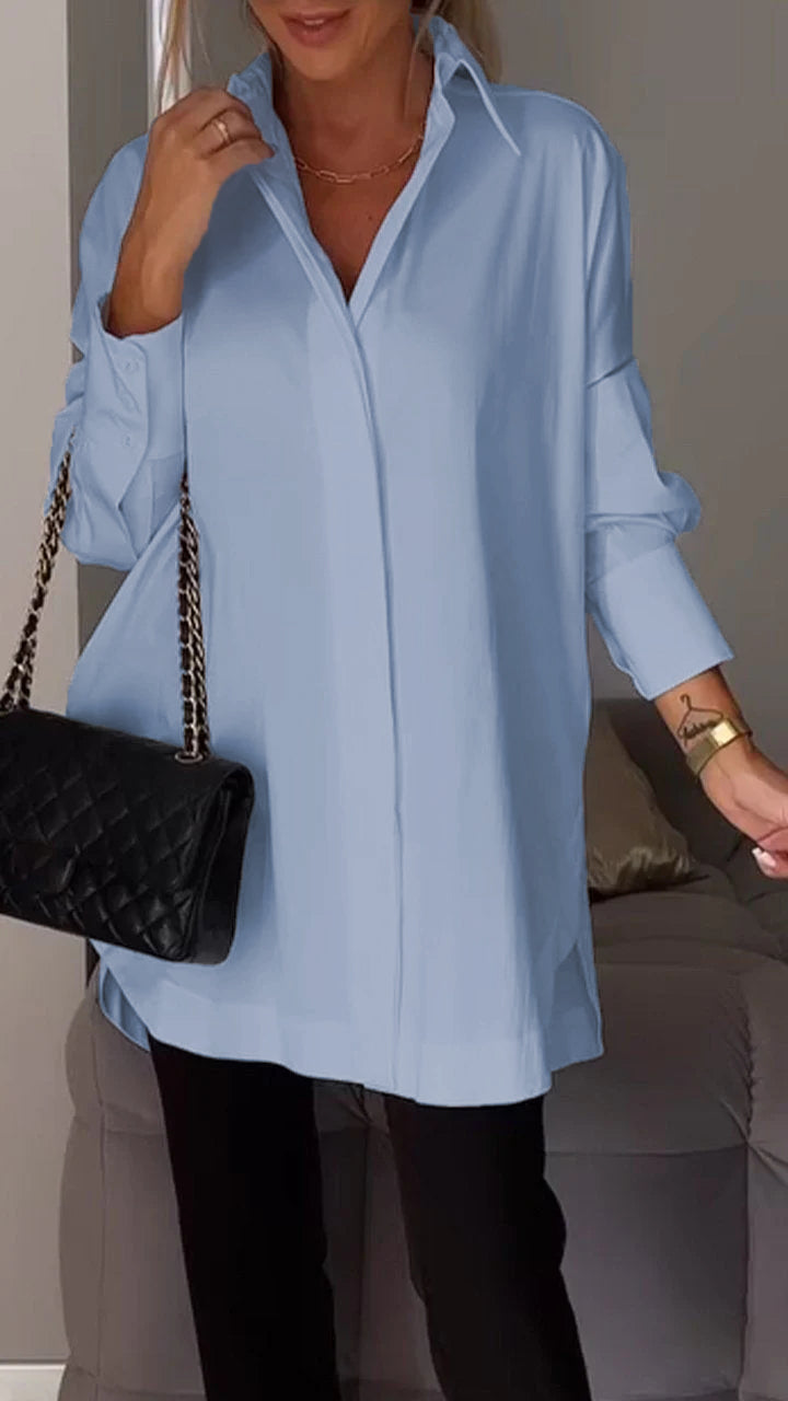 Modern women's oversized collared top, a stylish and comfortable long sleeve blouse for versatile fashion.