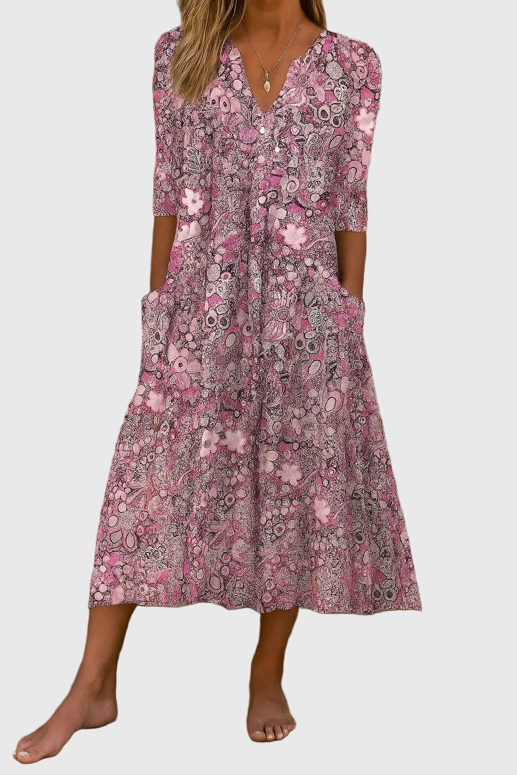 Elegant women's printed V-neck midi dress, three-quarter sleeves, relaxed flowy fit, ideal for daily spring & summer wear.