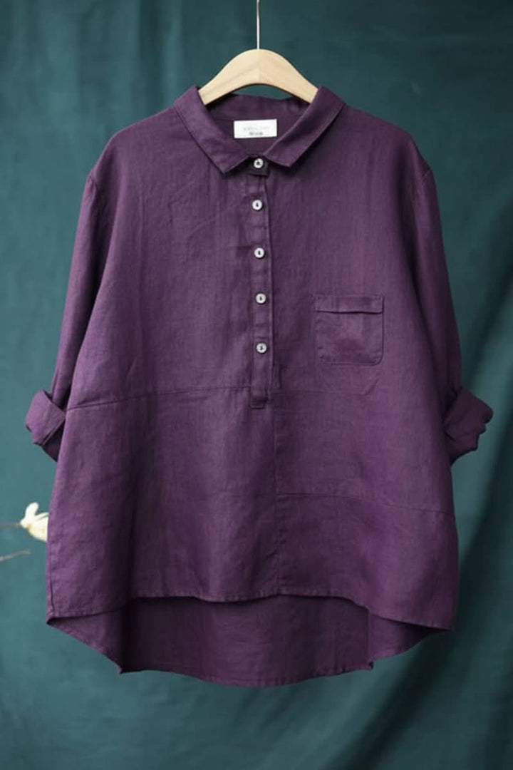 Hip-length women's long sleeve blouse, a comfortable and versatile casual top for everyday fashion.