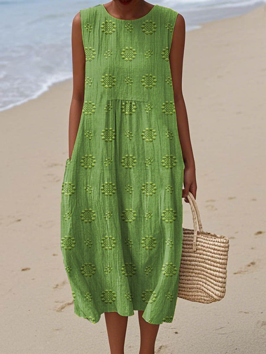 Women's effortless summer midi dress, relaxed fit, sleeveless, with convenient pockets, perfect for casual everyday wear.