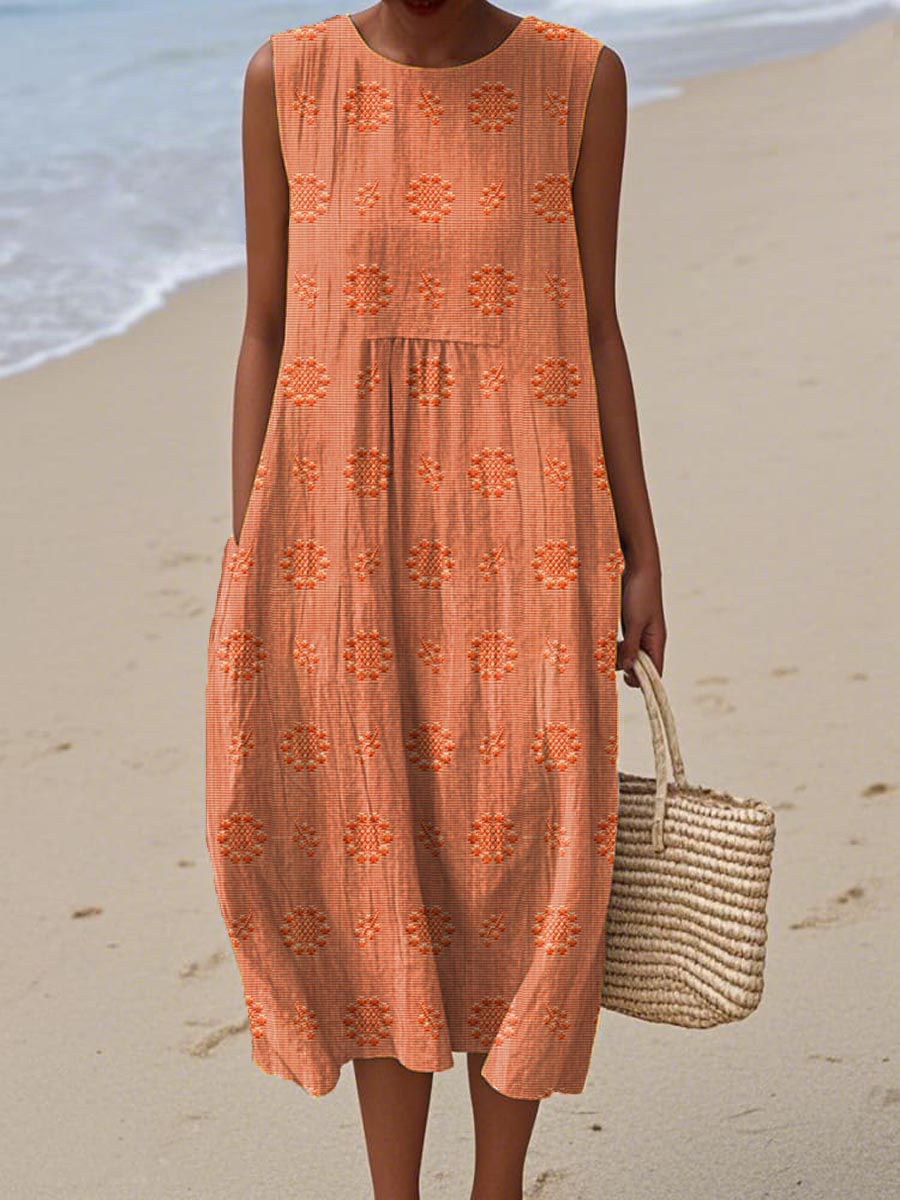 Elegant flowy midi dress for women, sleeveless, relaxed fit with practical pockets, perfect for warm summer days.