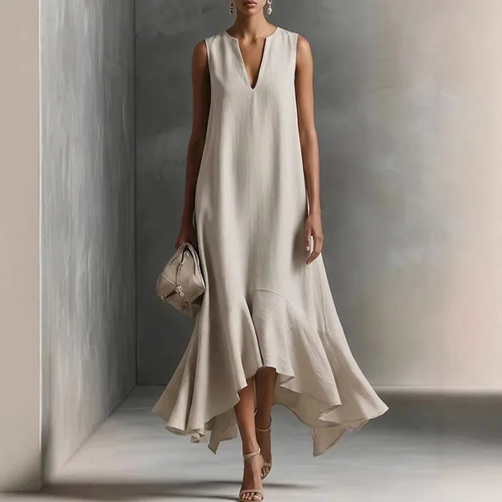 Women's effortless V-neck flowy sundress in a relaxed fit, perfect for summer casual wear with ruffle hem.