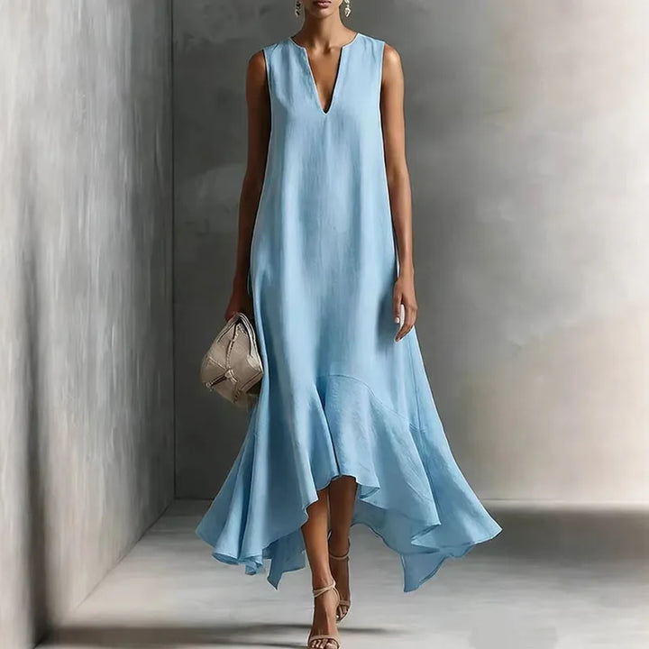 Sleeveless V-neck flowy sundress for women, ideal as a comfortable summer casual dress with an elegant ruffle hem.