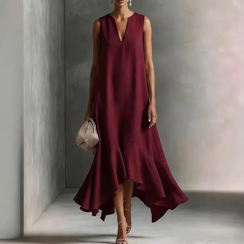 Versatile women's flowy V-neck sundress, comfortable and sleeveless, featuring a chic ruffle hem for summer days.