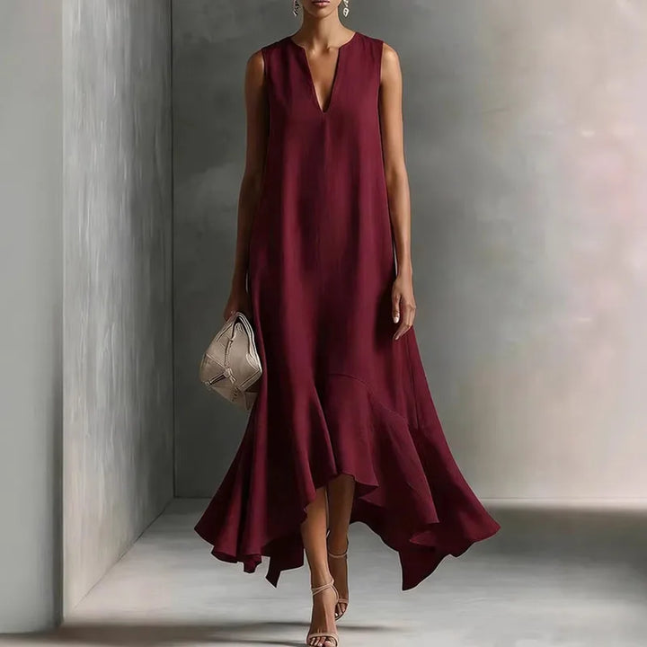 Versatile women's flowy V-neck sundress, comfortable and sleeveless, featuring a chic ruffle hem for summer days.