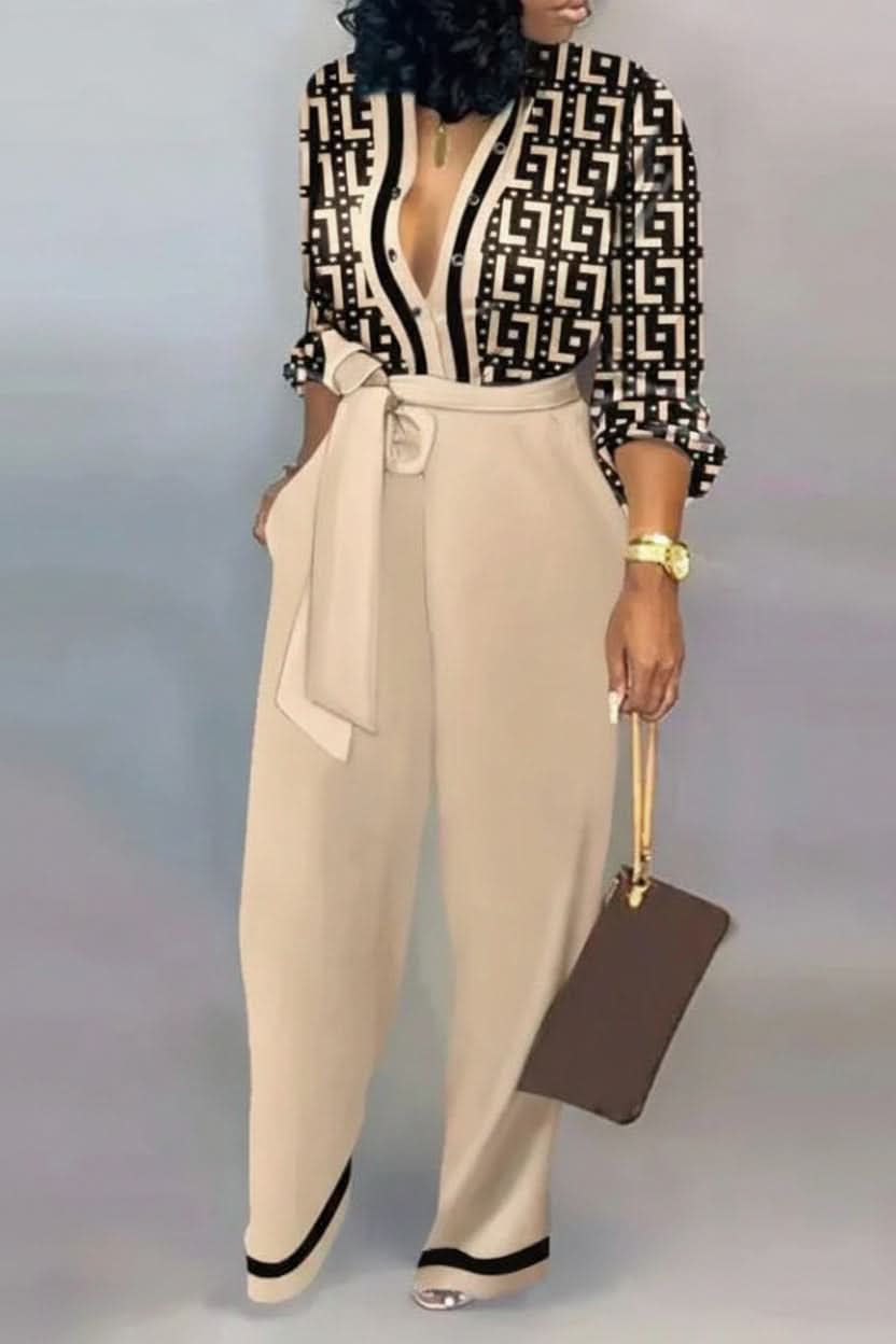 Women's effortless V-neck jumpsuit in a comfortable fabric, perfect for stylish casual wear and comfort.
