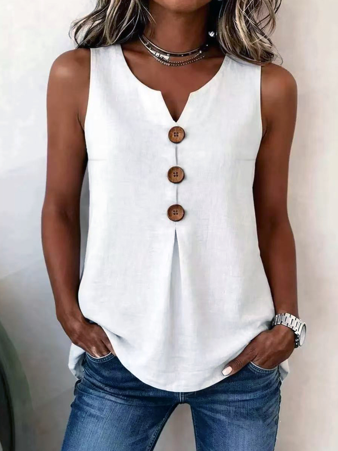 Comfortable women's sleeveless V-neck top featuring a chic pleated front. Ideal for effortless everyday spring & summer style.