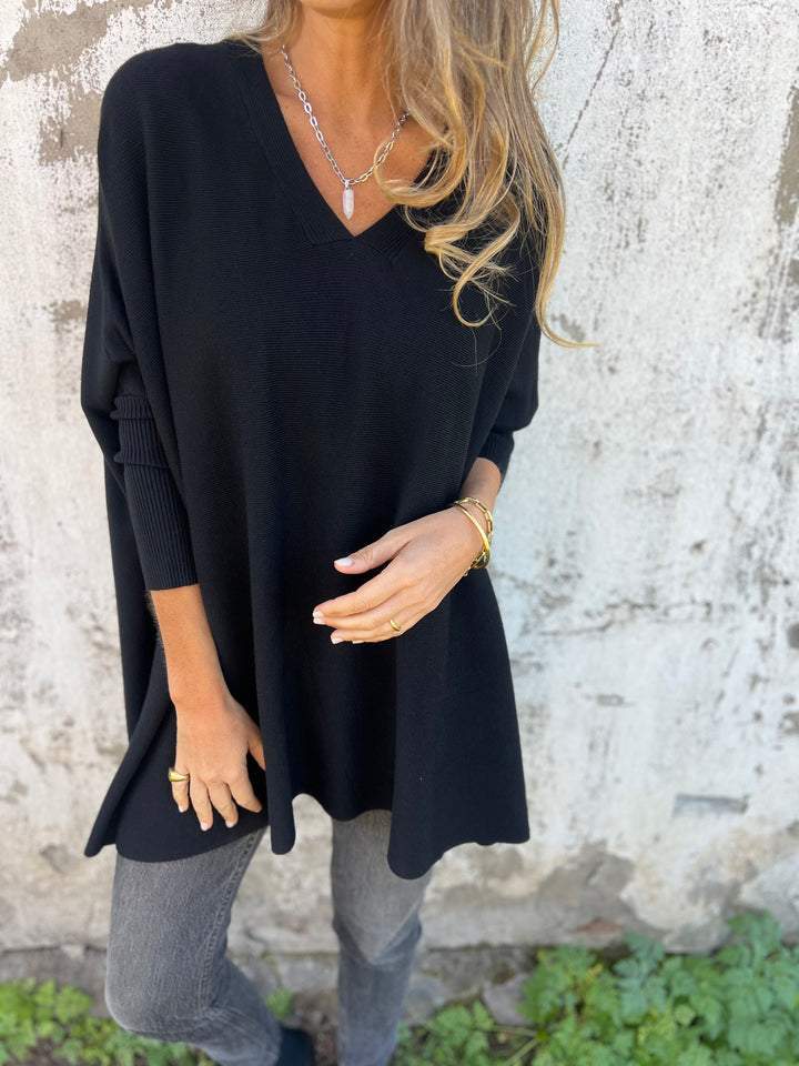 Women's Effortless V-Neck Swing Tunic Sweater with relaxed fit & batwing sleeves, perfect for fall casual style.