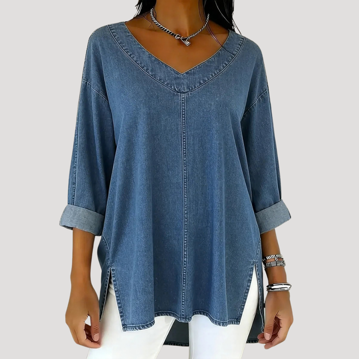 Women's effortless v-neck tunic top with elbow sleeves & stylish side slits. Relaxed fit for casual comfort.