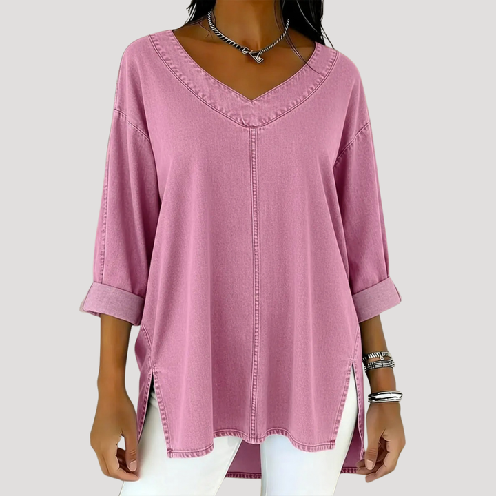 Effortless women's v-neck tunic top with elbow sleeves & side slits. Comfortable & versatile for everyday fashion.