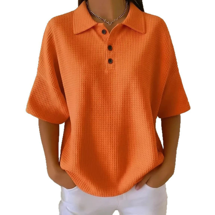Relaxed fit women's waffle knit polo blouse, short sleeve, button front & polo neck for spring/summer.
