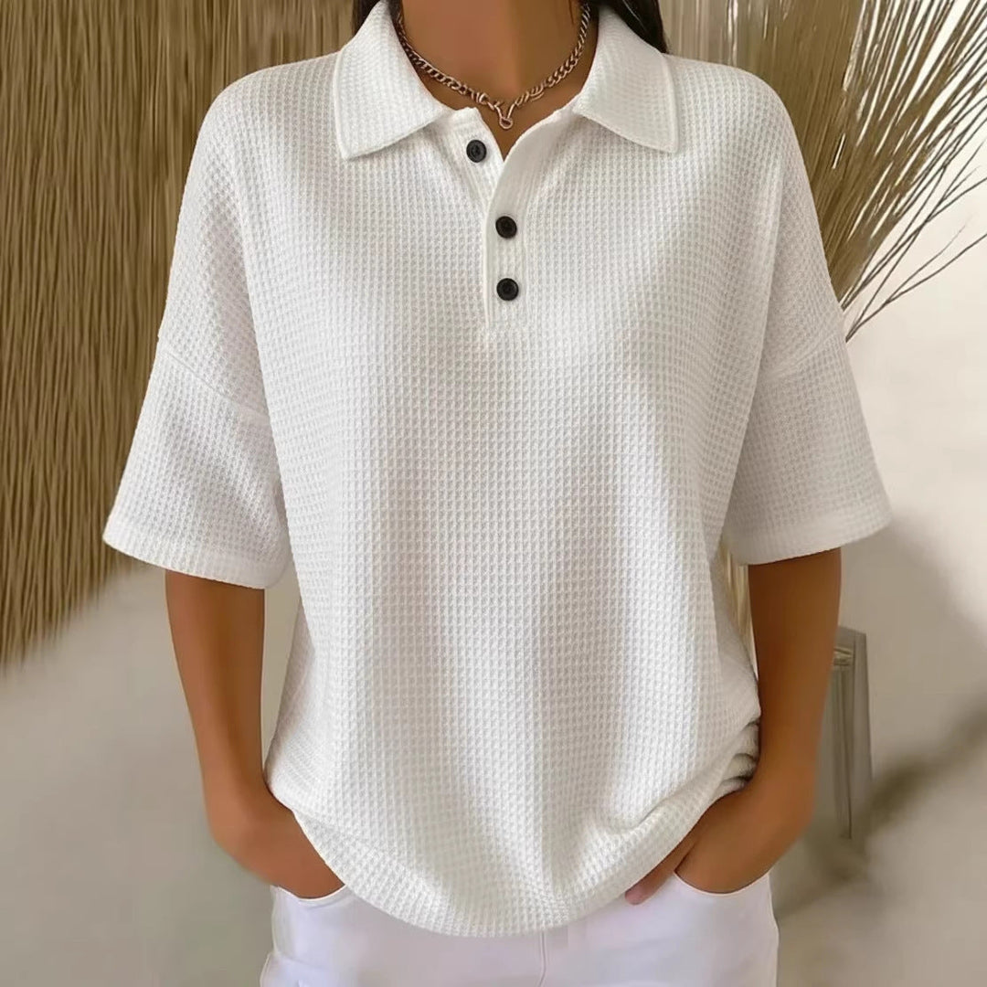 Versatile women's short sleeve waffle knit polo blouse. Loose fit top for casual summer fashion.