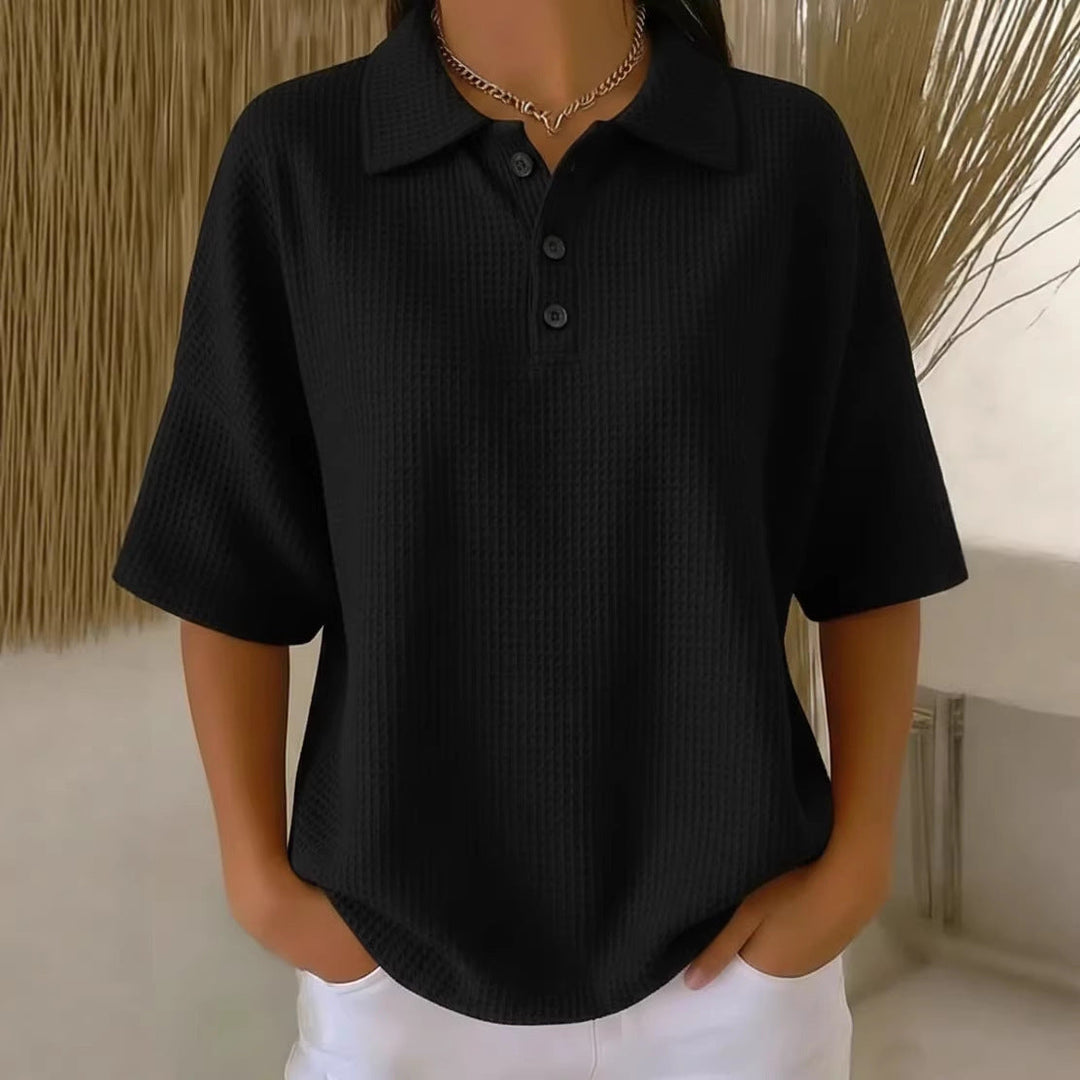 Women's spring/summer waffle knit polo blouse, short sleeve, loose fit, button front detail.