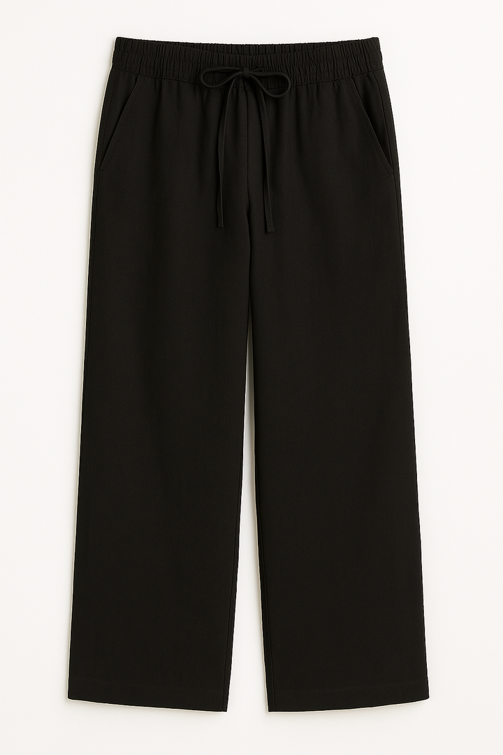 Lightweight women's wide-leg summer trousers for ultimate comfort, featuring a relaxed fit for effortless warm weather fashion.