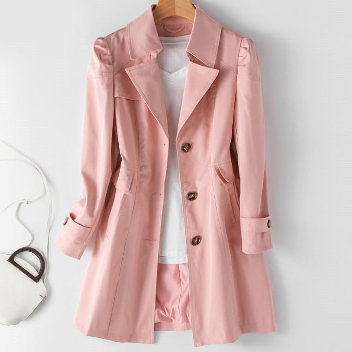 Fashionable women's structured trench coat in a classic shade, offering timeless elegance and a chic silhouette.