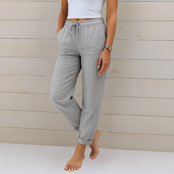 Effortless women's straight leg ankle pants with an elastic waist and drawstring, perfect for a relaxed fit.