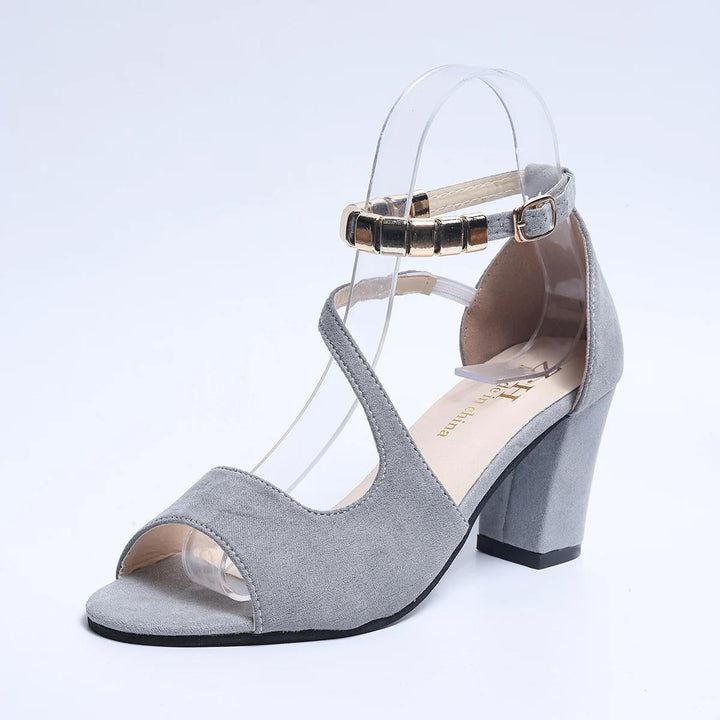 Comfortable women's open toe block heel sandals with an eye-catching beaded ankle strap.