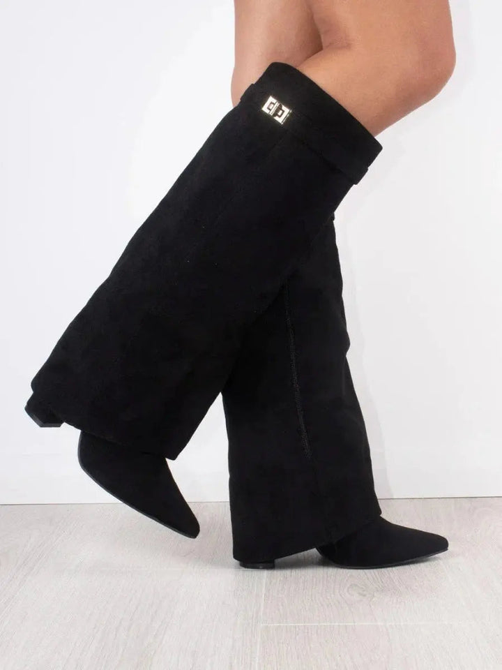 Women's elegant black pointed toe knee-high boots with a stylish wedge heel for fall fashion.
