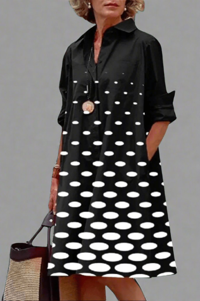Women's elegant black polka dot button-up shirt midi dress. Perfect for smart casual spring/summer chic fashion.