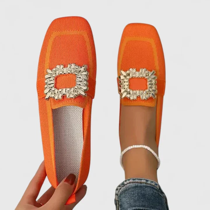 Versatile black women's slip-on loafers, featuring a fashionable square toe and dazzling crystal buckle detail.
