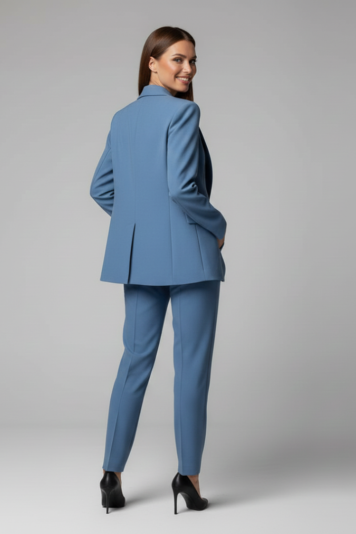 Sophisticated women's blue blazer and trousers suit set. Ideal for professional wear, office, or formal events.