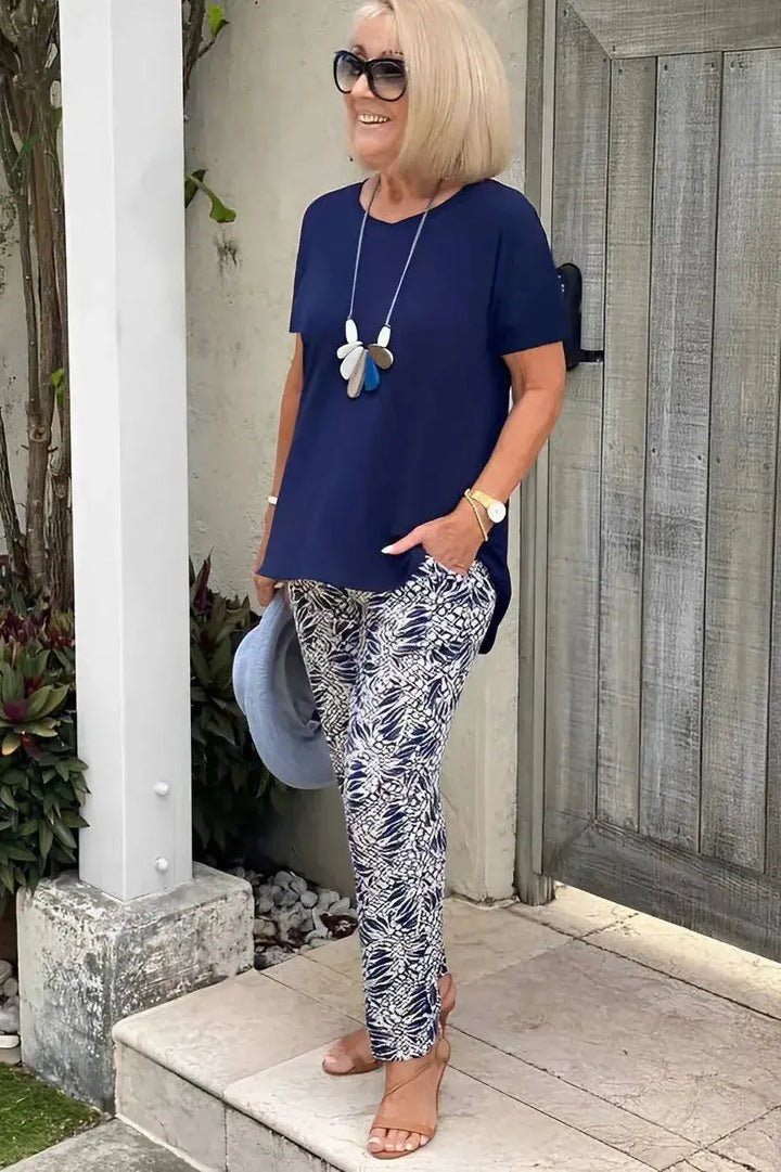 Stylish women's patterned long sleeve top, an elegant shirt for versatile office attire or casual chic.