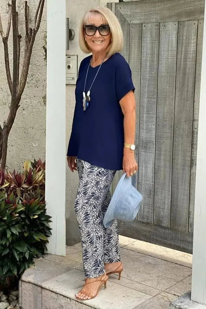 Comfortable women's relaxed fit blouse featuring an elegant blue pattern, ideal for daily wear.