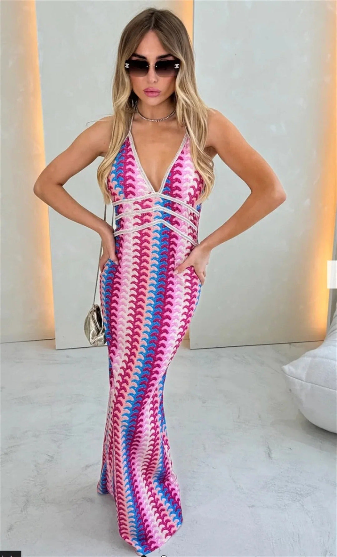 Women's elegant boho printed V-neck maxi dress, perfect for a summer wedding guest or special occasion.