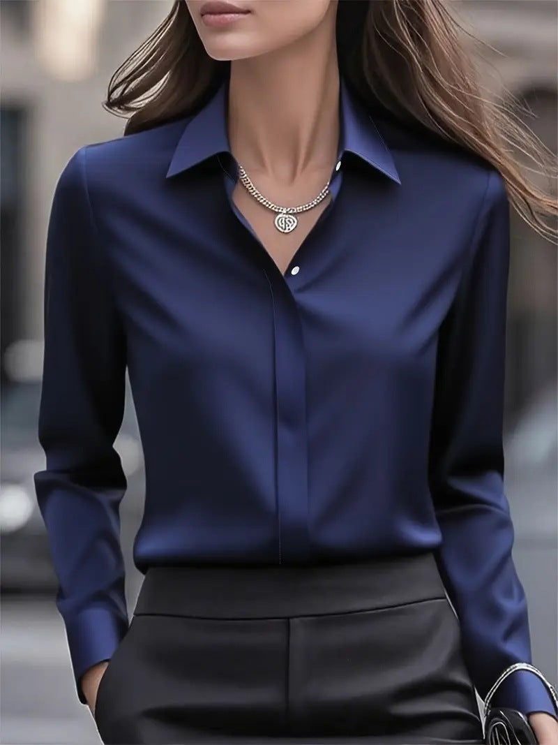 Formal women's elegant button-accent blouse, a chic long-sleeve top for professional occasions.