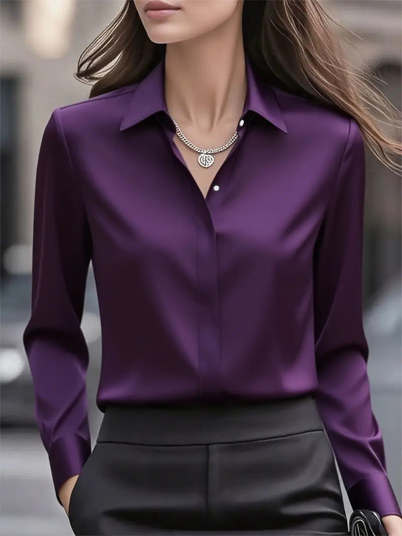 Women's fashionable button-accent blouse, an elegant long-sleeve top for professional and chic style.