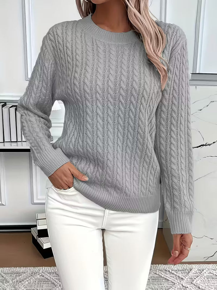 Soft, cozy cable knit crew neck women's jumper, ideal for cool autumn days & comfortable style.
