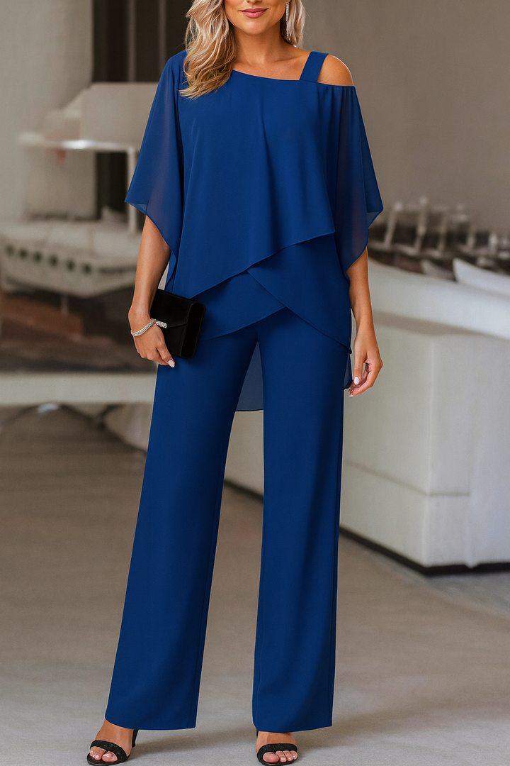 Chic women's coordinated two-piece pants set with cold-shoulder design, ideal for events or stylish modern fashion.