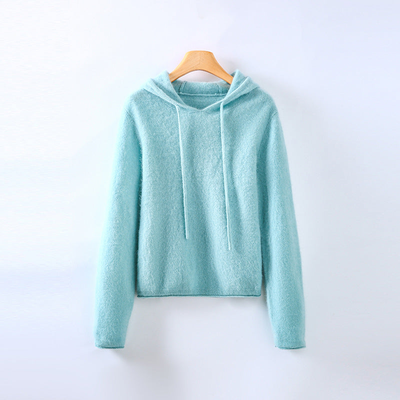 Elegant women's long-sleeve pullover hoodie in a soft comfortwear fabric, perfect for casual chic.