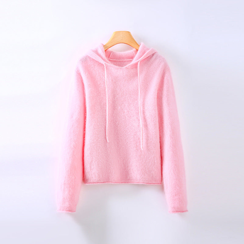 Comfortable women's pullover hoodie with a cozy hood & long sleeves, ideal for relaxed everyday wear.
