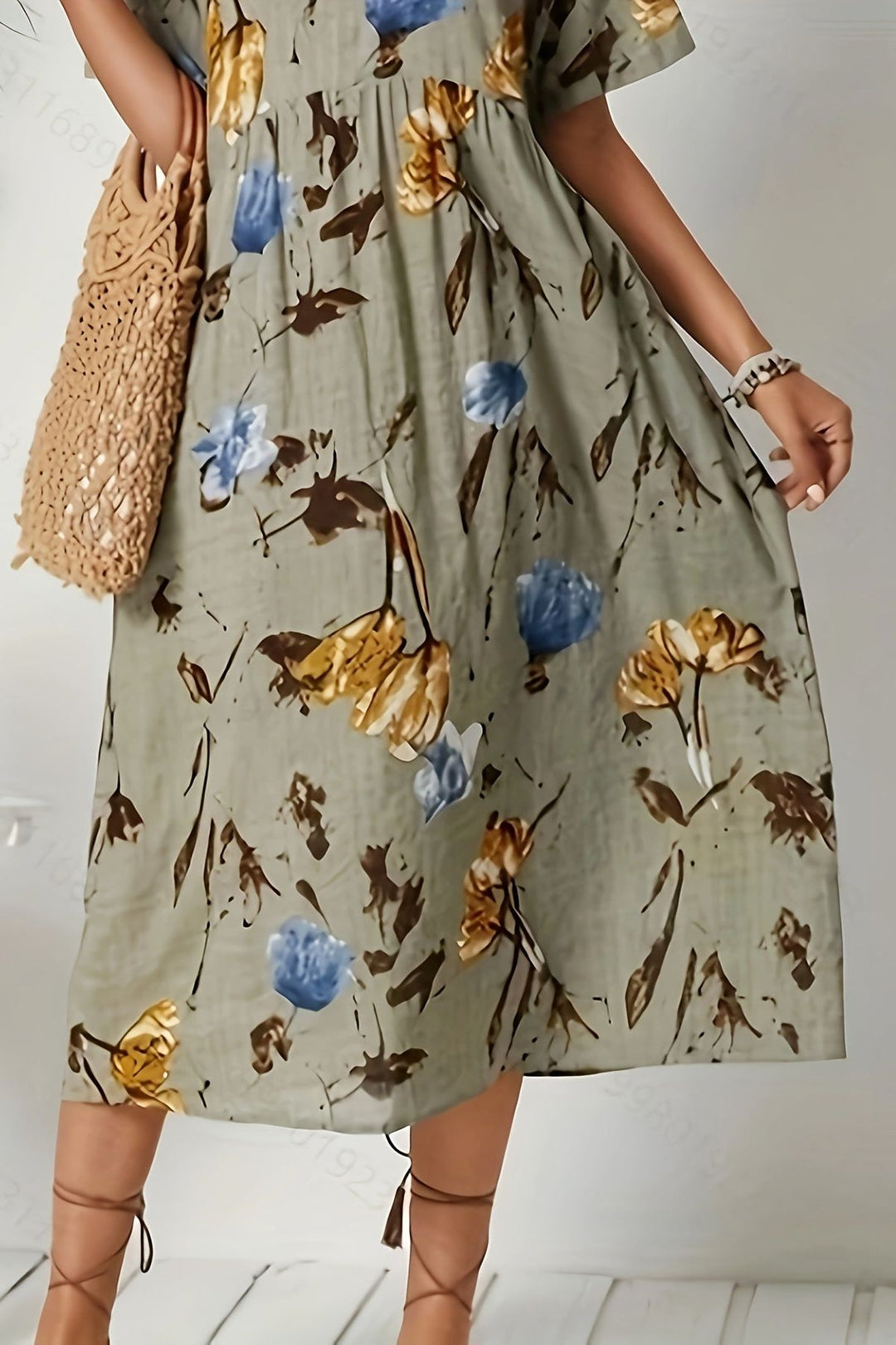 Dark khaki floral print midi dress. Elegant women's spring/summer dress with a sophisticated feminine pattern.
